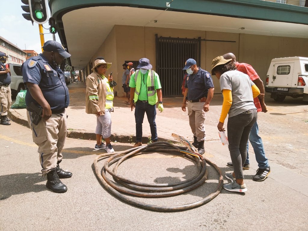 City_Ekurhuleni's tweet photo. We are going #Back2Basics and putting an end to lawlessness.
The #Germiston CBD is abuzz with activity this morning with our #Engergy team uprooting illegal connections 🔌 and disconnecting hijacked buildings in the CBD that are using electricity illegally. #SeeItReportIt https://t.co/16G4EVqu6p
