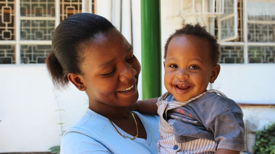 ForeverAngelsTZ's tweet photo. Is the middle of the week dragging? A bit of #WednesdayMotivation for you is Neema, a child care worker who started with us at age 15 and is now one of our most experienced premature baby carers - and she's holding  a small smiler for you too! #HappyWednesday! https://t.co/ftPOH2W72d