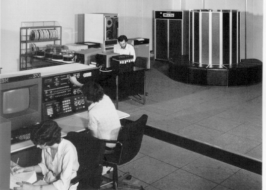 The Cray-1 at Daresbury Laboratory in 1979. The IBM 370/165 at the Rutherford Laboratory computer centre was used as a front end.