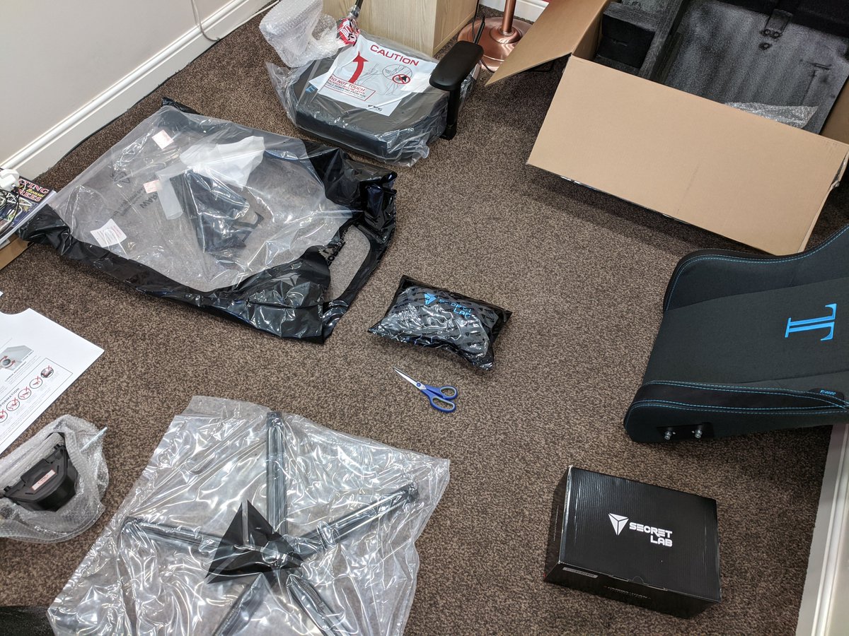 From delivery to fantastic new chair in one boxsplosion and a few easy steps. Loving my new #SecretLab office chair so far. Excellent (if a little excessive) packaging and instructions, and fully adjustable. Just have to figure out how to keep my curious cat away from it now!