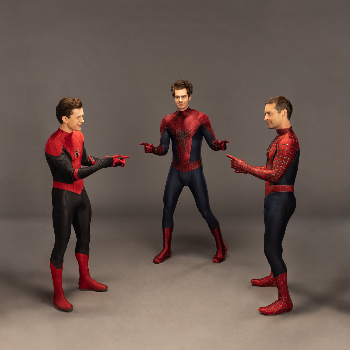 RottenTomatoes's tweet photo. They did it! Tom Holland, Andrew Garfield and Tobey Maguire recreated the Spider-Man meme! https://t.co/rRr09AigYp
