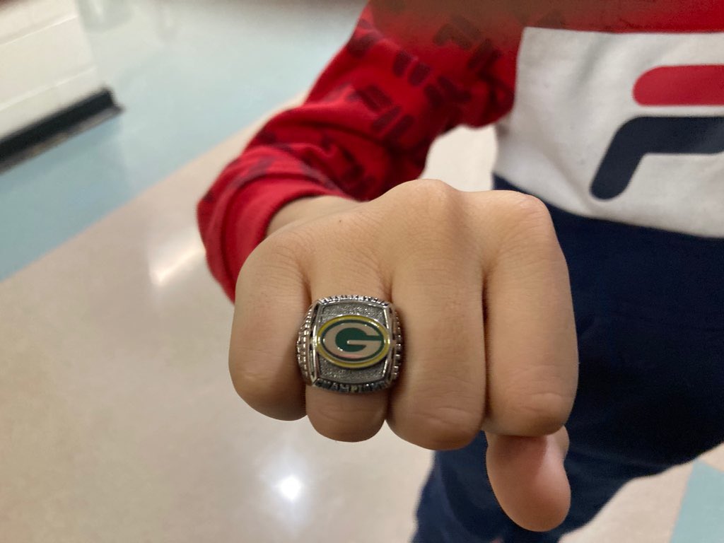 NelsonWhynder's tweet photo. Our grade 4 student Martaze, a member of the Greenfield Packers Football team showing off his championship ring. Congratulations. We’re proud of you https://t.co/DJREsi16cx
