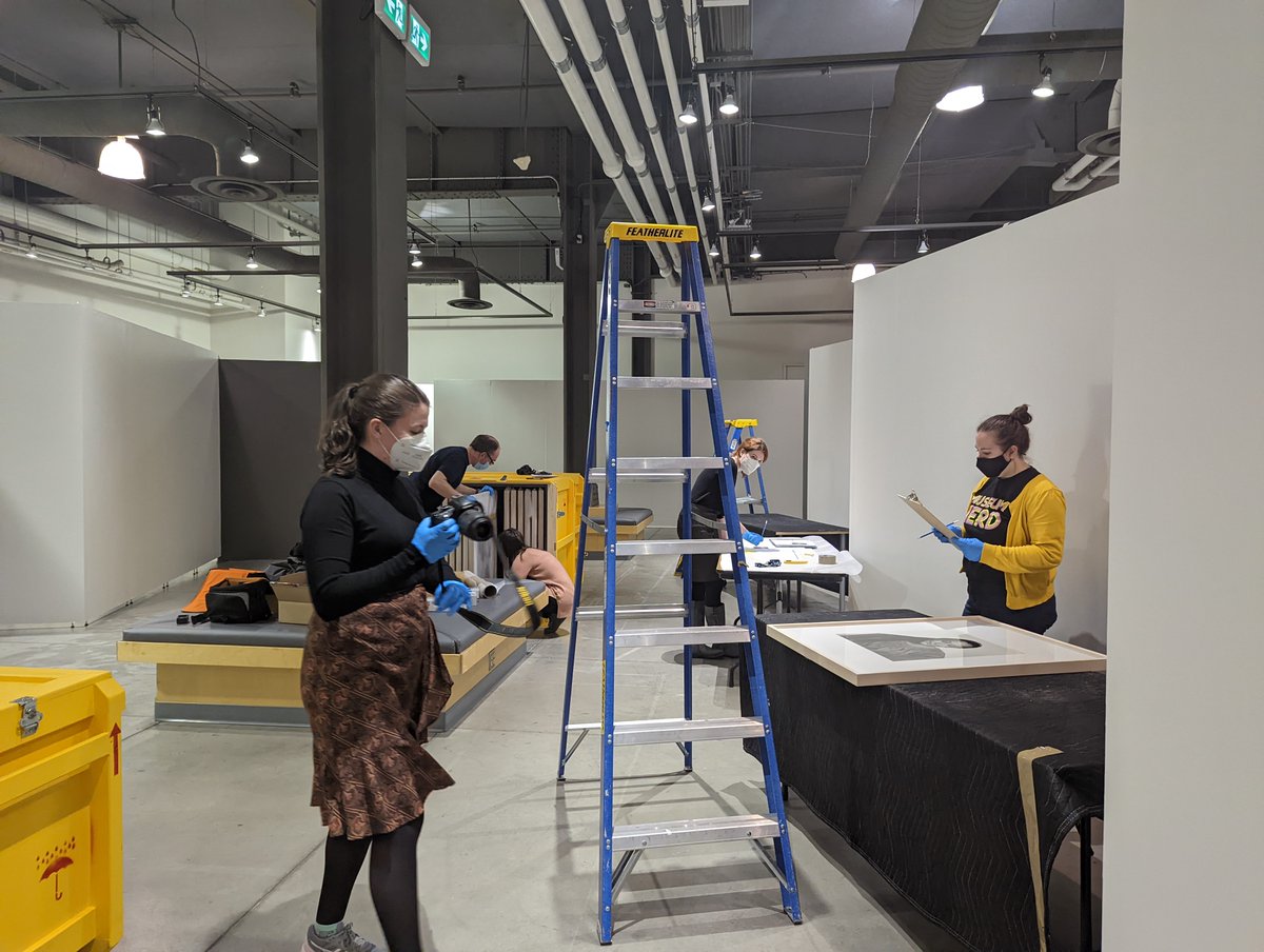 conlin_dan's tweet photo. The Collections team @Pier21 busy with condition reports for the 110 original prints by this master portrait photographer (and refugee) which have arrived for the "The World of Yousuf Karsh" exhibition opening March 12:  https://t.co/q5xVX65yrW #KarshIsComing @mbamtl @KarshYousuf https://t.co/DxGBf0VDEm