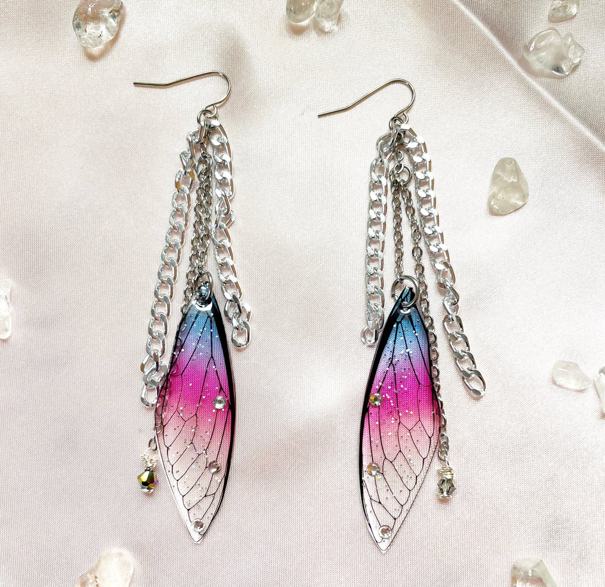 Fairy wing earrings 🧚‍♀️ now available! Only two unique pairs left. Find them here RadiantArtByRose.Etsy.com