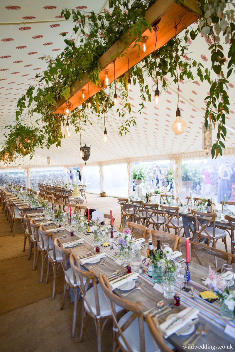 Our printed linings looking fabulous with our suspended plank lights and Moroccan lanterns 😍🌿✨. <a href="/WeddingHour/">#WeddingHour</a> 

Photographer @wildweddings
Venue @bake_barn_fhe
.
.
#abbasmarquees #printedlinings #wedding #weddinghire #marqueewedding #linings #weddinginspiration #weddinghour
