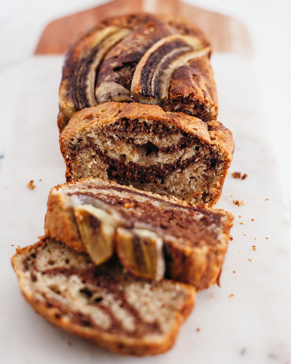 Happy #NationalBananaBreadDay! 🍌 Take your banana bread recipe up a notch with this Marble Banana Bread recipe by <a href="/wearesovegan/">So Vegan Ⓥ</a>. You'll love the combination of banana, chocolate and coconut! bit.ly/32YEYwe #veganrecipes