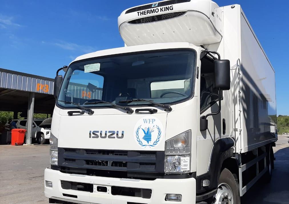 WFP_Cuba's tweet photo. La entrega de estos recursos (4 contenedores y 2 camiones refrigerados, y otros insumos) forma parte del apoyo integral del #PMACuba para asistir la respuesta de Cuba a la pandemia de la #COVID19 https://t.co/z6oq13YDEH