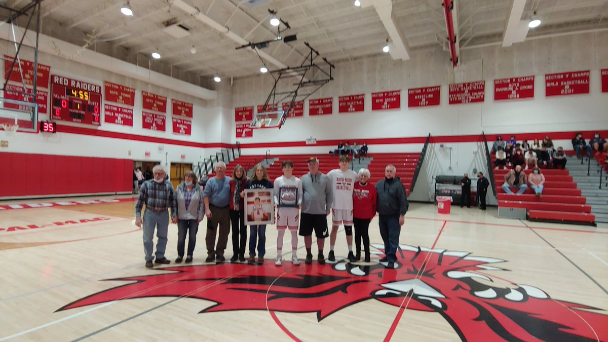 Recognizing 1000 point scorer Paulie Goodness before tip off with his family.