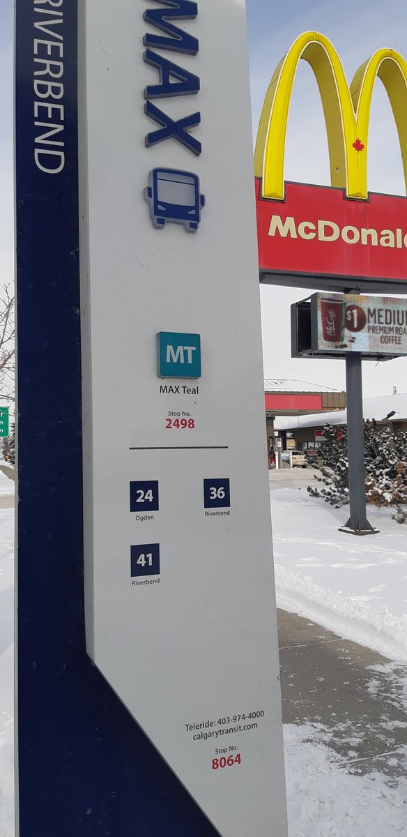 scammyjammer's tweet photo. @calgarytransit Can you ask the shovellers to do the whole stop, not just a 10 foot wide area? More than 1 bus pulls in and then the people in the second bus are stepping into huge piles of snow. There's also a yellow safety line under all that which should be cleared. https://t.co/28aOPF8j8E