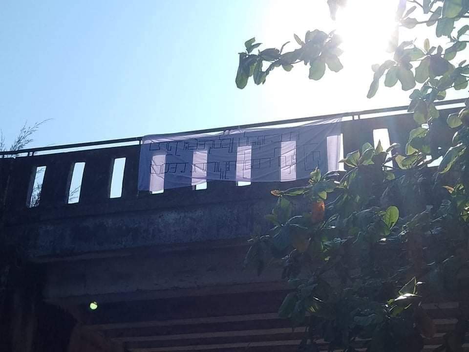pinkythwe's tweet photo. Anti-coup revolutionary banner was hung is Yangon's N.Okkalapa Twp. 🪧  #2022Feb24Coup #NoFlyZoneInMyanmar #WhatsHappeningInMyanmar https://t.co/m2pYTu8jBS