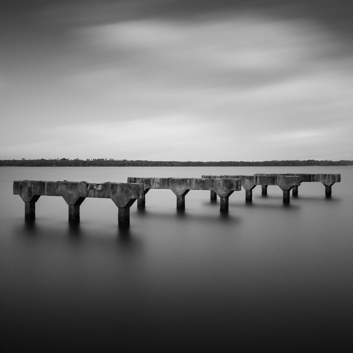 DGrenengerAU's tweet photo. 'Remnants' (2022)⁣⁣⁣⁣
⁣A #longexposure of the Queensland heritage listed 'Southern Portal' of the Hornibrook Highway Road Bridge, demolished in 2012.
#hornibrookbridge #redcliffepeninsula #fujifilmx_au #longexposure #blackandwhitephoto https://t.co/b9vAWmEUTW