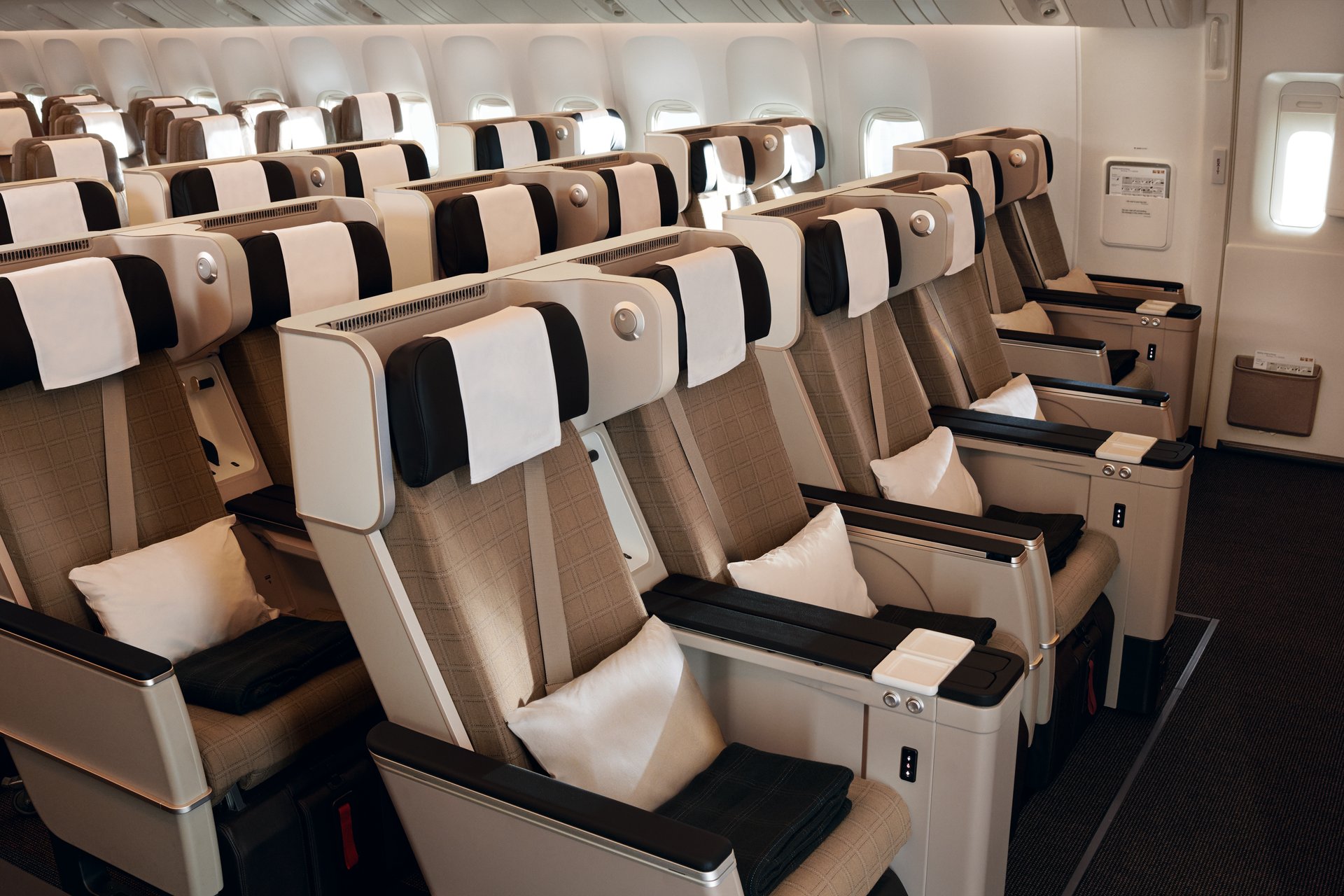 Swiss Intl Air Lines X This is our new SWISS Premium Economy enhanced comfort with a hardshell seat that reclines at no inconvenience to the guest behind sustainable amenity kits noise reducing