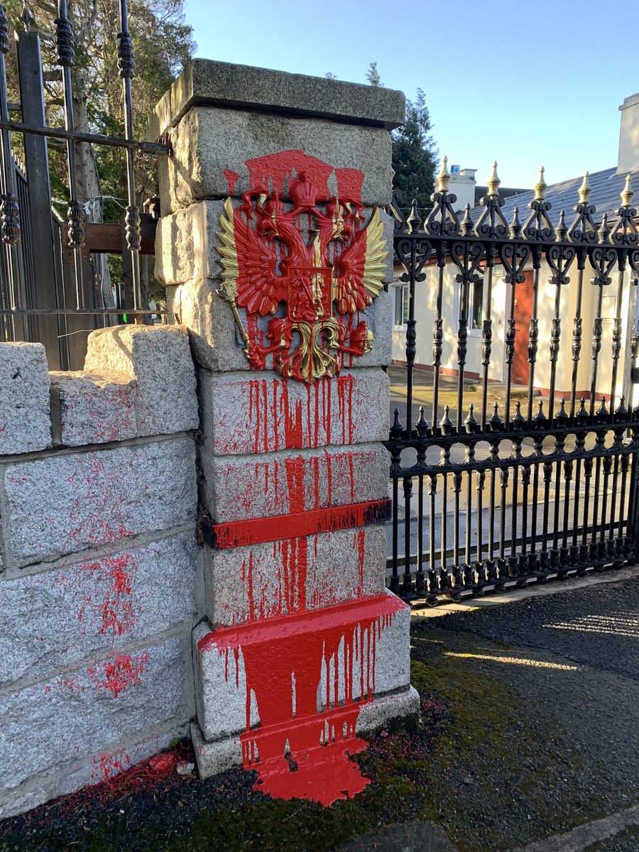 dimitriodonnell's tweet photo. Entrance to Russian embassy in Dublin covered in red paint during a small protest outside main gates @rtenews #UkraineRussiaCrisis https://t.co/LwHgKgMsar