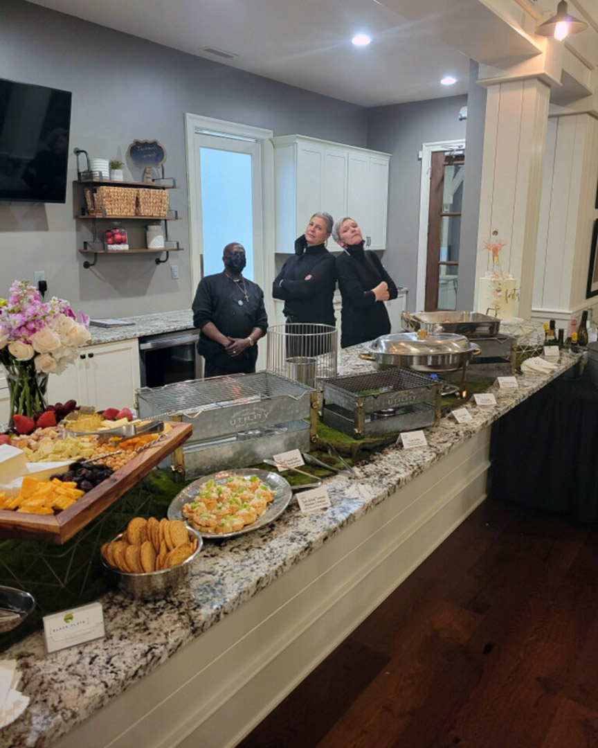 Dona, Michelle, and Morris prepping to serve a hot dish of #attitude at a recent event in the clubhouse at <a href="/JacksonsGrant/">Jacksons Grant</a>.

#forkyeah #indycatering #blackplatecatering