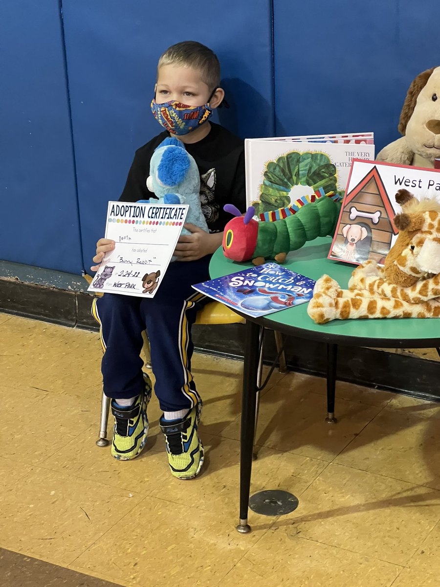 Devin picking a new book and a new stuffed pet.   #shadowastudent #raveonravenna