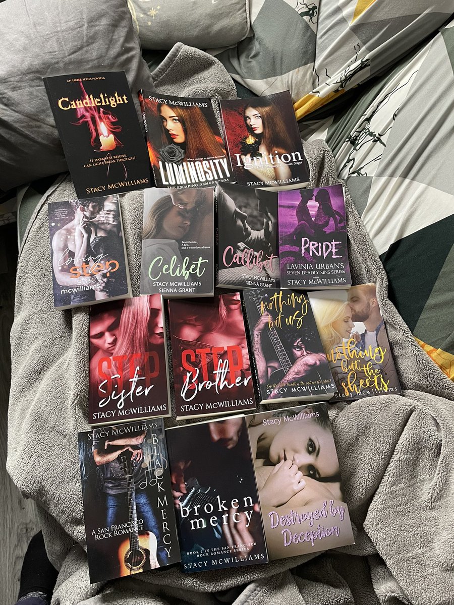 stacemcw's tweet photo. These are all of the books I’ve written together. Wow. It’s amazing to see them all (bar the one I couldn’t find for the photo) l. I’m so proud of me and all my hard work. #authors #writers #prettycovers #books #WritingCommunity https://t.co/dBS6WrGccK