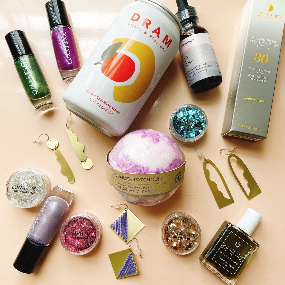 Mardi Gras needs 🥳💜 Eco glitter, sunscreen, cute earrings, eco polish, tinctures, perfume, &amp; more - come on through! ✨