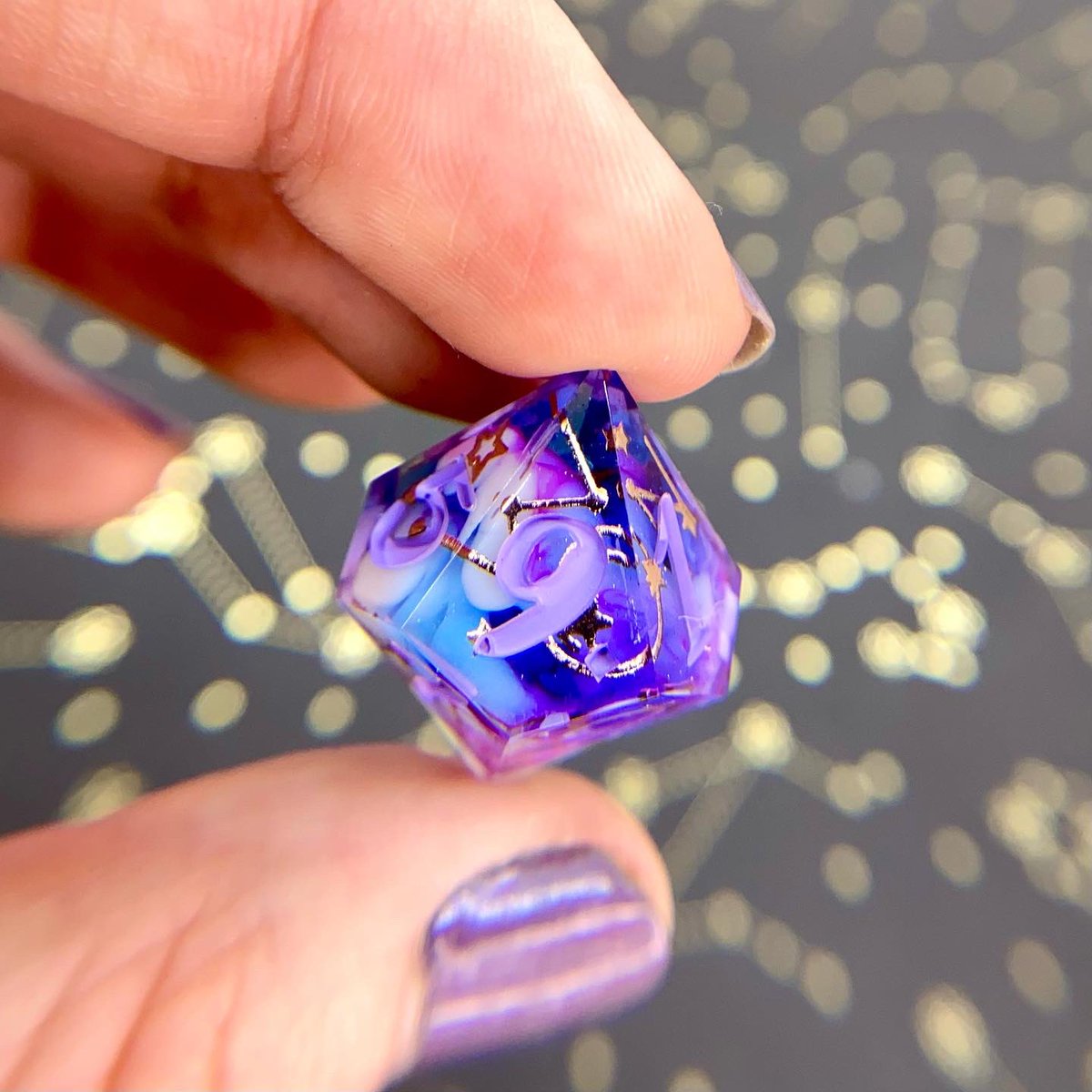 Dreamy_Dice's tweet image. “Dream Weaver” - A blue sky with a swirl of purple, white clouds, and champagne gold celestial decals 🥰