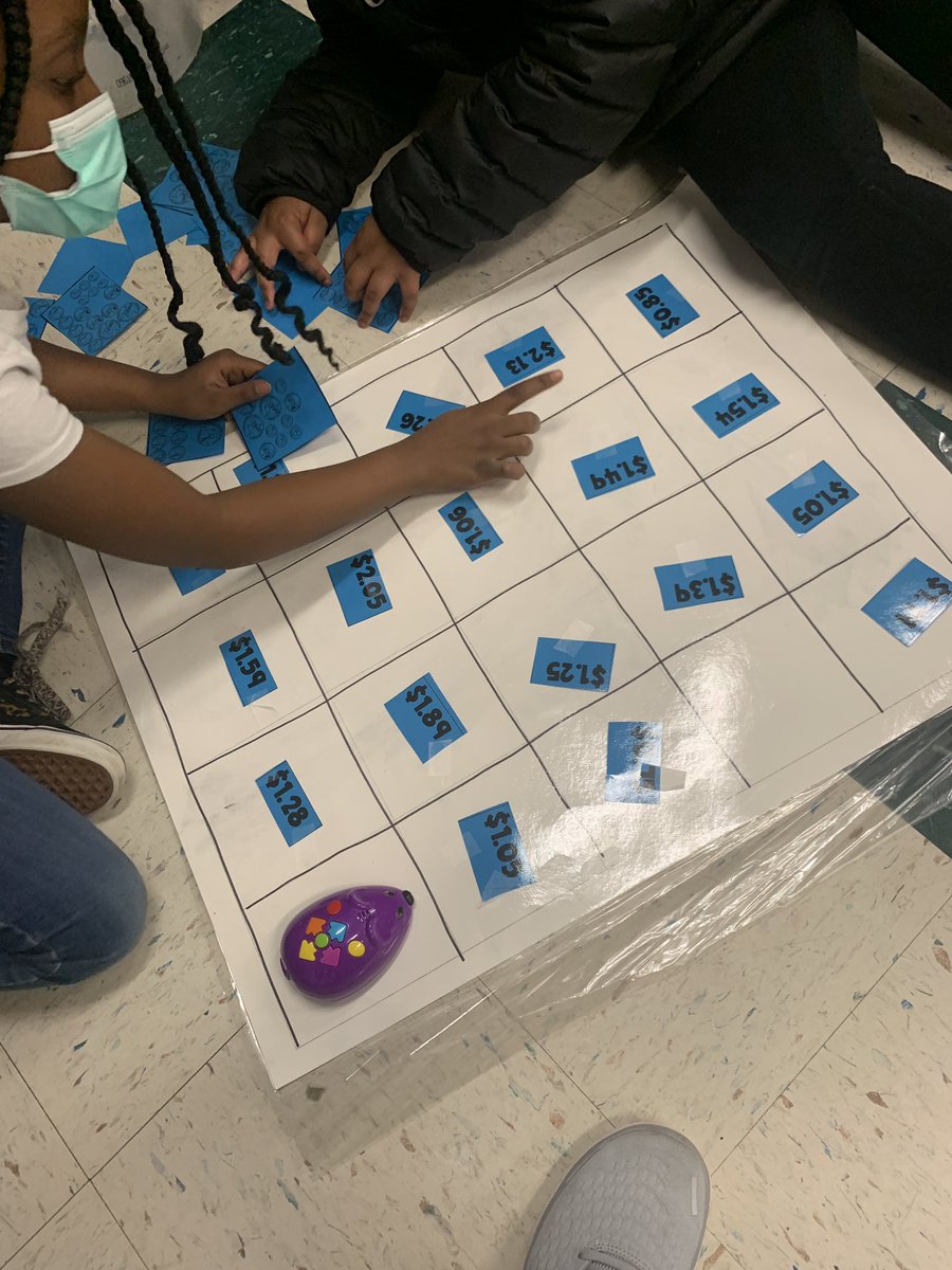 Kadieenglish's tweet image. 3rd grade using #codeandgo mice to count money! @HCPS_Innovates @FairOaksHCPS