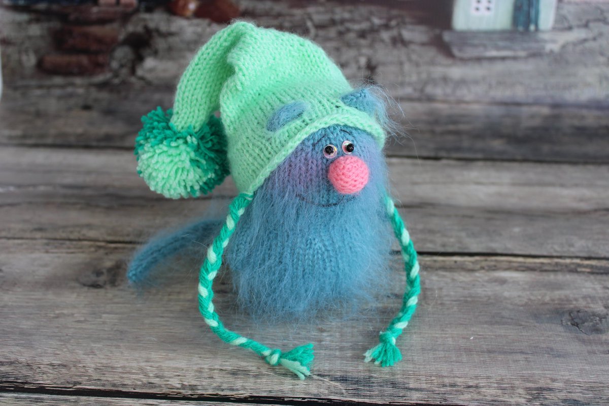 'This adorable green-blue kitten is always smiling.\nHe has a green hat to look smart and funny.\nWith this toy you will always smile' etsy.me/3HdVfvj #catplush #easterbasketstuffers #catstuffedanimal #deskpet #miniatureplush #cutegifts #eastertoy #catinthehat