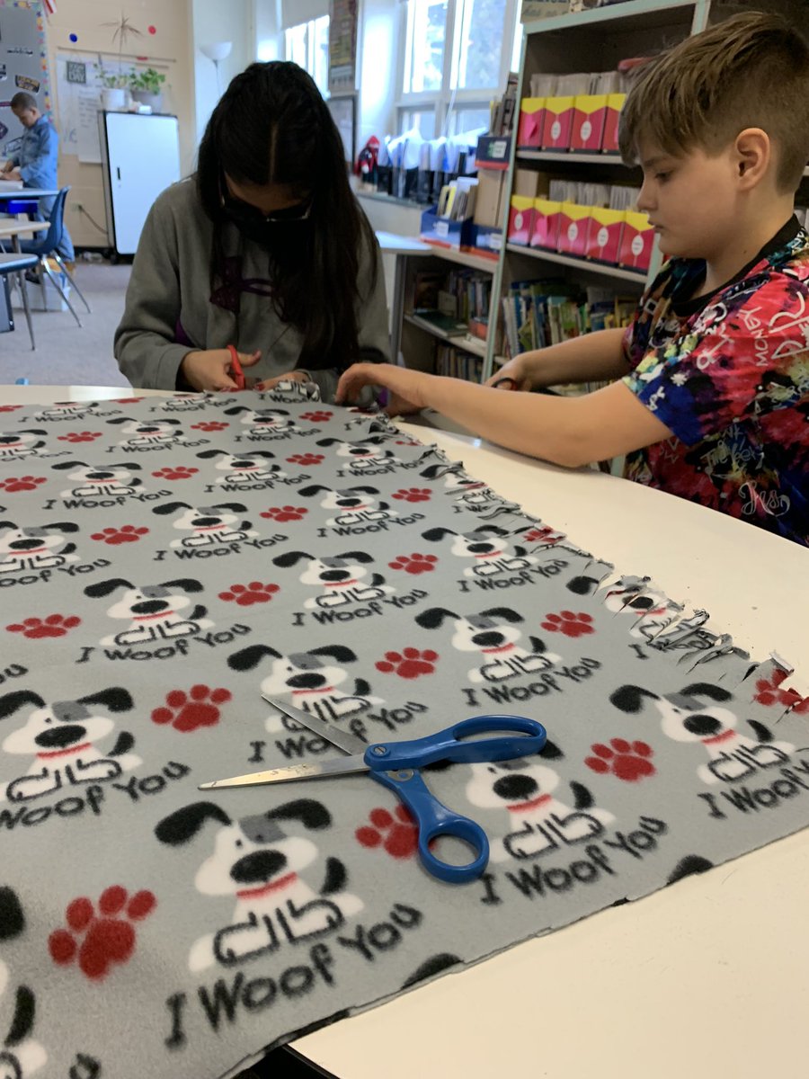 Working on dog blankets for Shelter Dogs.  Another service project the students are working on.#Winfield34