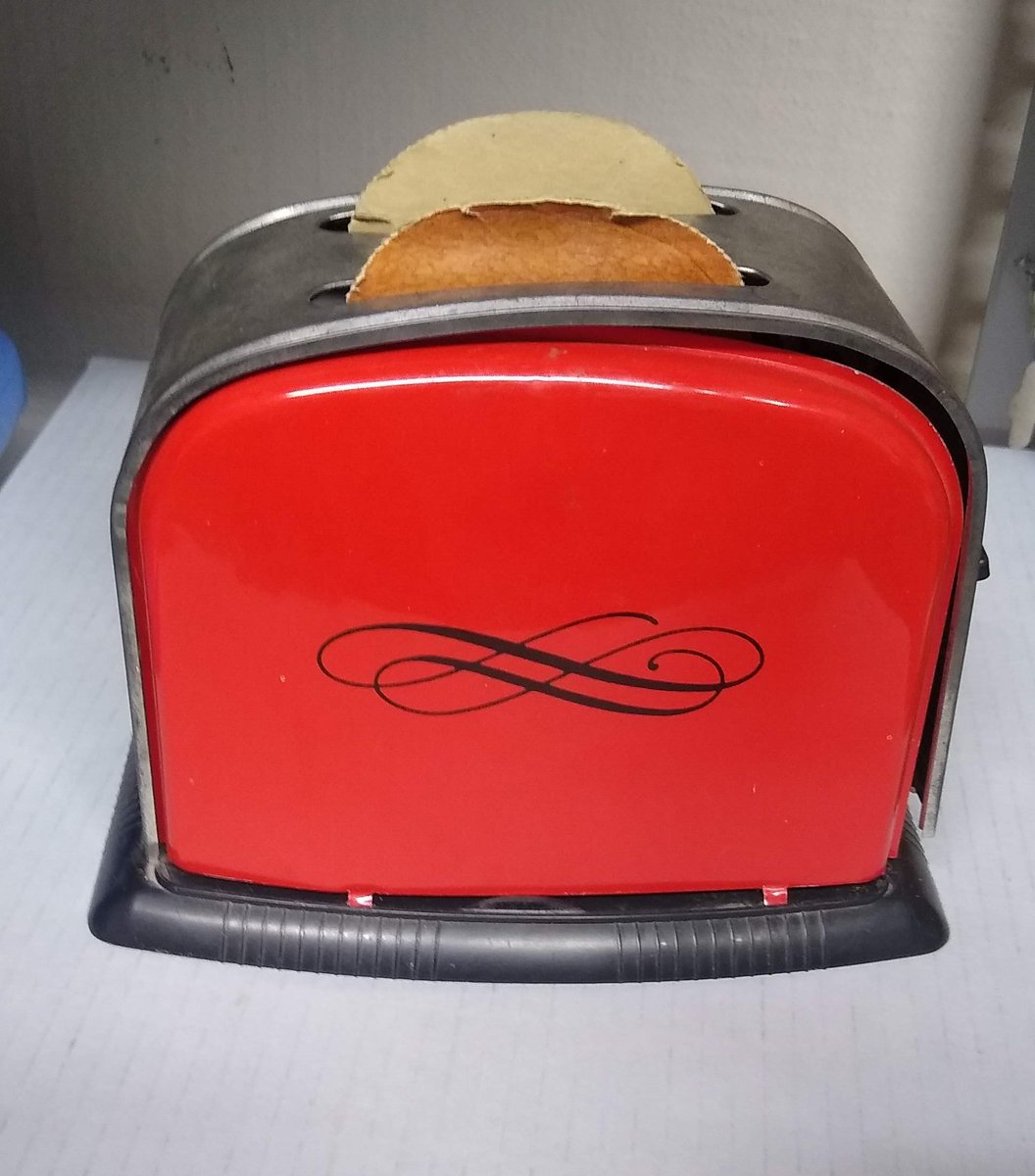 DacotahPrairie's tweet photo. #NationalToastDay From our DPM collection, the cutest tin 1950s toy toaster with cardboard toast. #NeverBurnt https://t.co/dEydrhHY0W