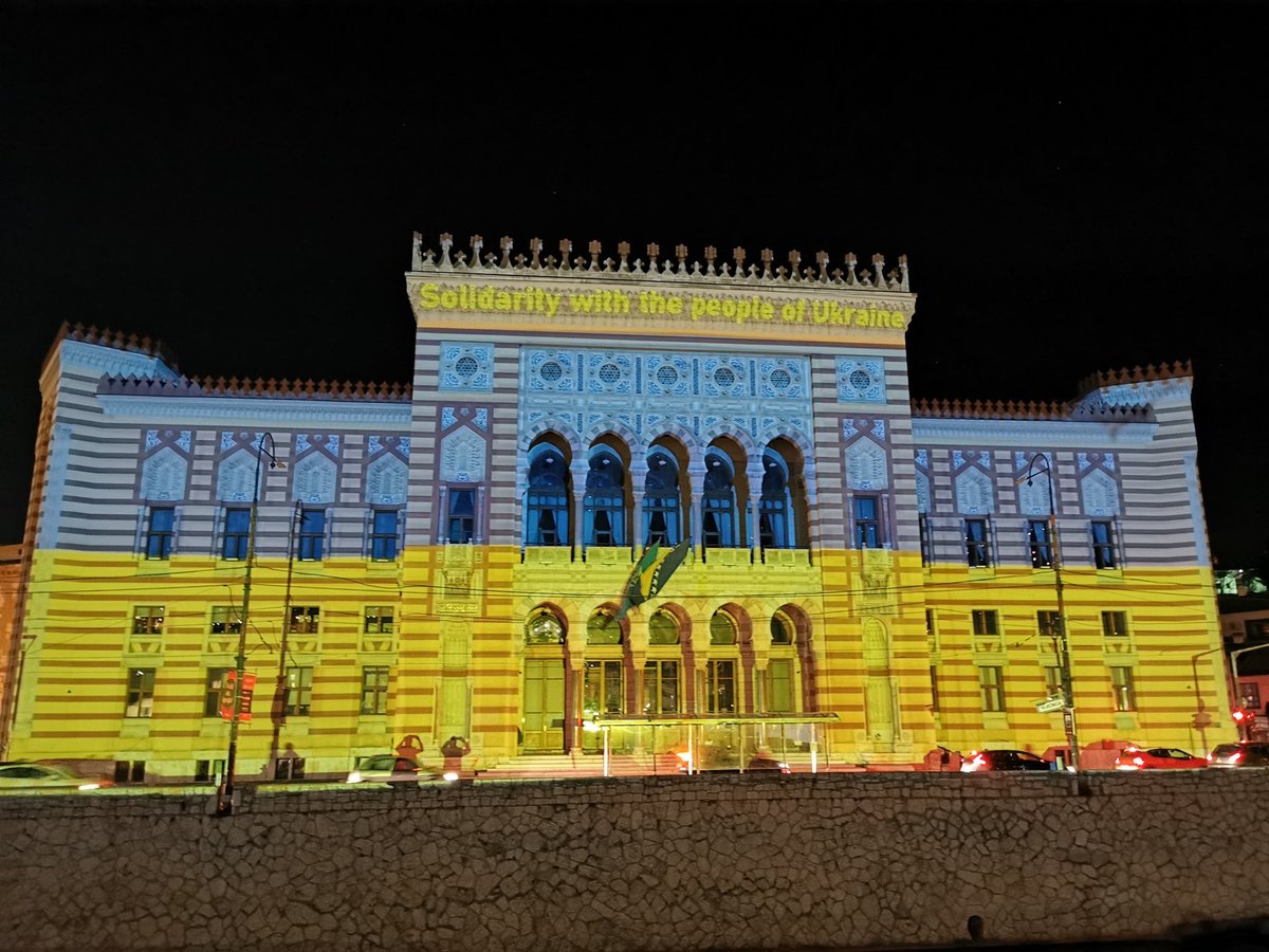 Sarajevo’s city hall, destroyed during the siege and later rebuilt, lit up in solidarity with Ukraine tonight