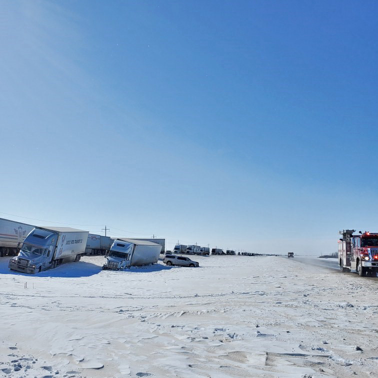 rcmpmb's tweet photo. Multi vehicle collision w/approx 20 semis &amp; 5 passenger vehicles has closed #MBHwy1, in both directions, between Virden &amp; Brandon. 3 transported to hospital w injuries. #MBHwy1 expected to be closed for an extended period of time. Detours in place. Please avoid the area. #rcmpmb https://t.co/l9sqcvwJ90