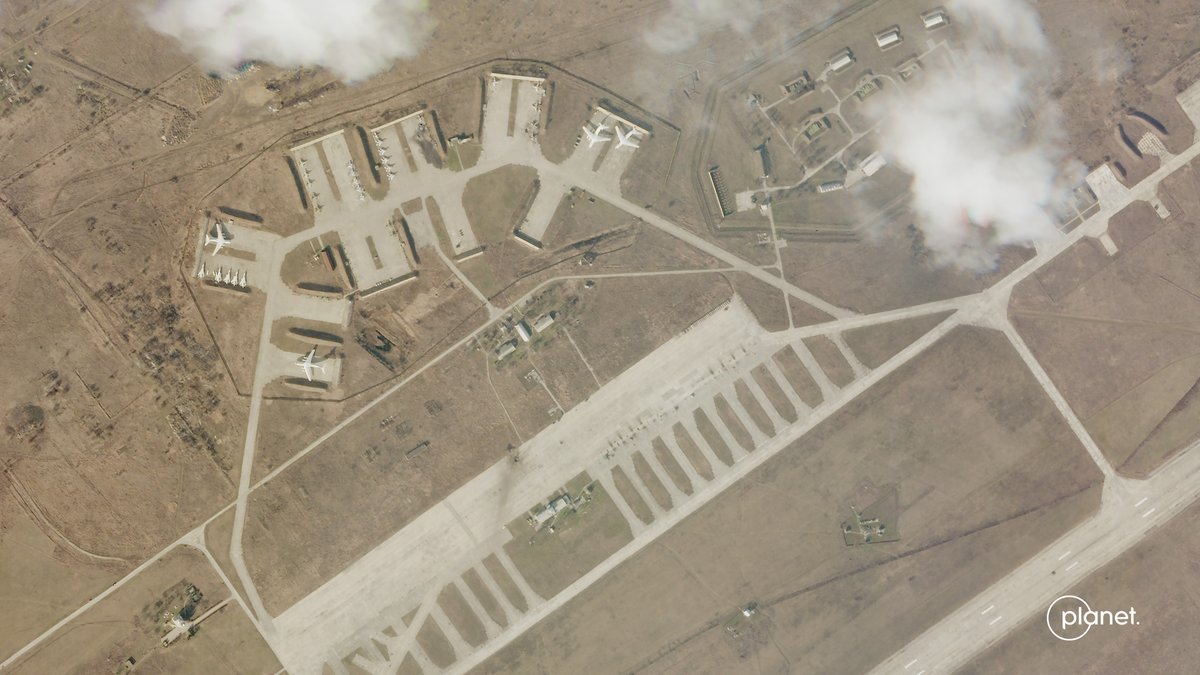 Planet imagery of Mikolaiv Air Base in Ukraine appears to show a Russian strike:First image from Feb. 21, second (and crop) are from today. https://www.cnbc.com/2022/02/24/satellite-imagery-shows-russian-attack-on-ukraine-from-space.html