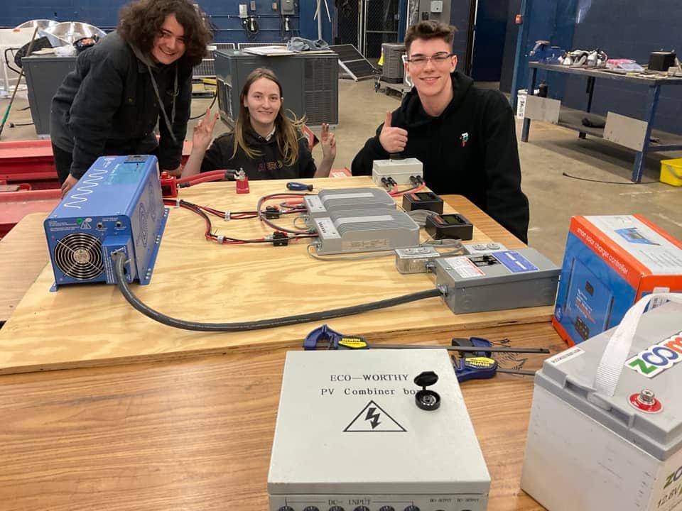 ngsliving's tweet photo. These three student technicians are working on upgrading the solar trailer/ portable solar generator. https://t.co/B3QoZJH8Aa