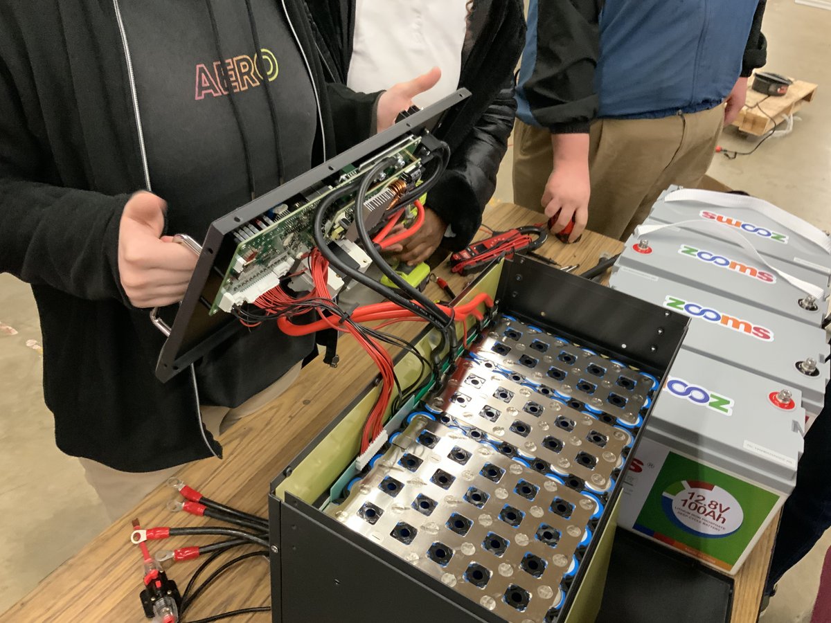ngsliving's tweet photo. These young student technicians are troubleshooting and repairing the battery management system on a large lithium battery. I don’t think you will find another group of high school students as capable as this group. These students are already industry certified. https://t.co/ZOBsLY8QGN