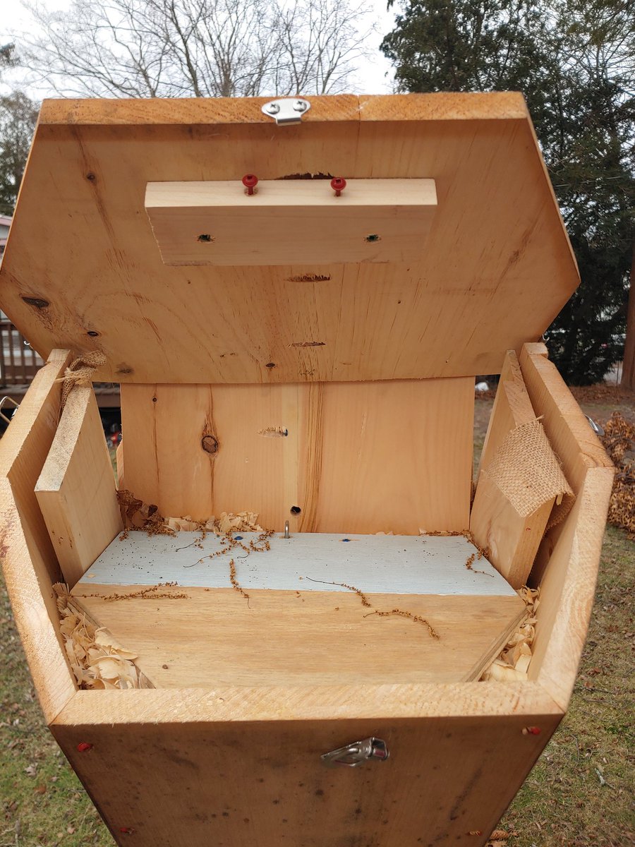 This is the top of the Colony Keeper where the feeder will go. When not needing to feed bees it can be packed with wood chips for added insulation. The 2 red screws are used for draft control.