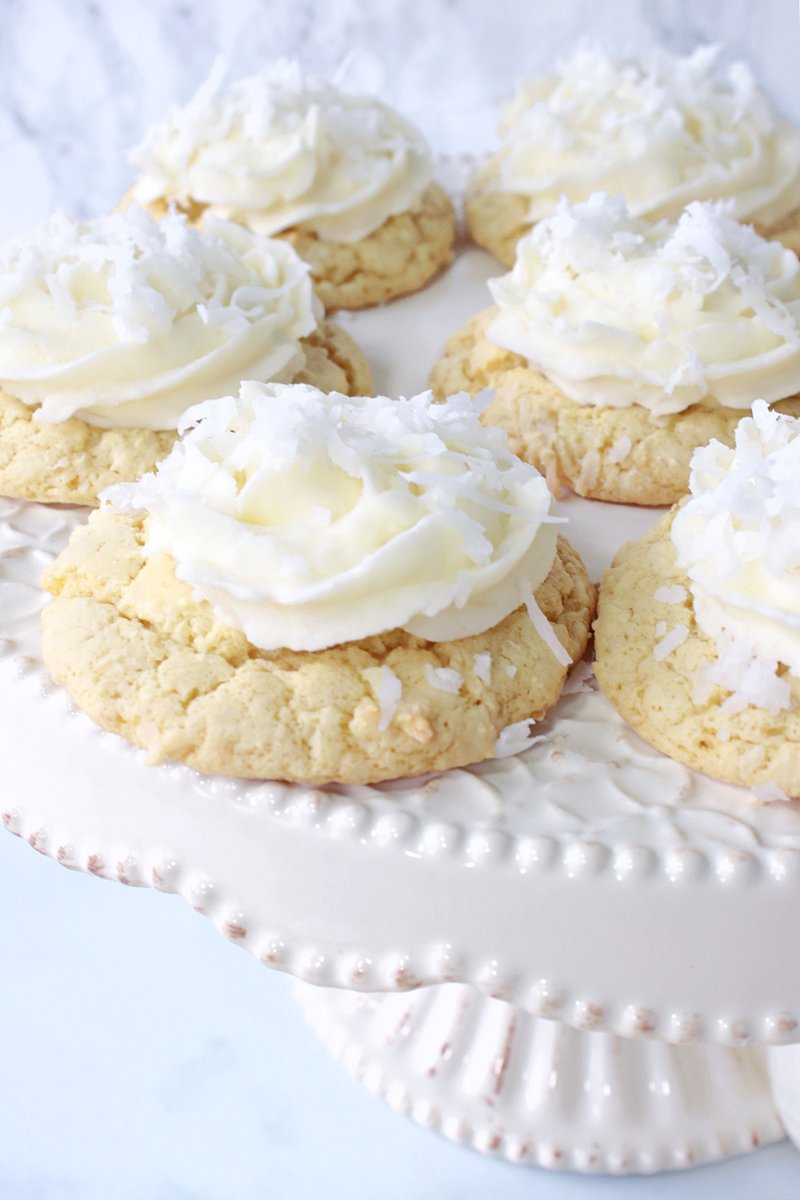 These beautifully elegant Coconut Cake Cookies look like they took a lot of time and effort, but they're are super easy to make because they utilize store-bought boxed cake mix. kudoskitchenbyrenee.com/coconut-cake-c…