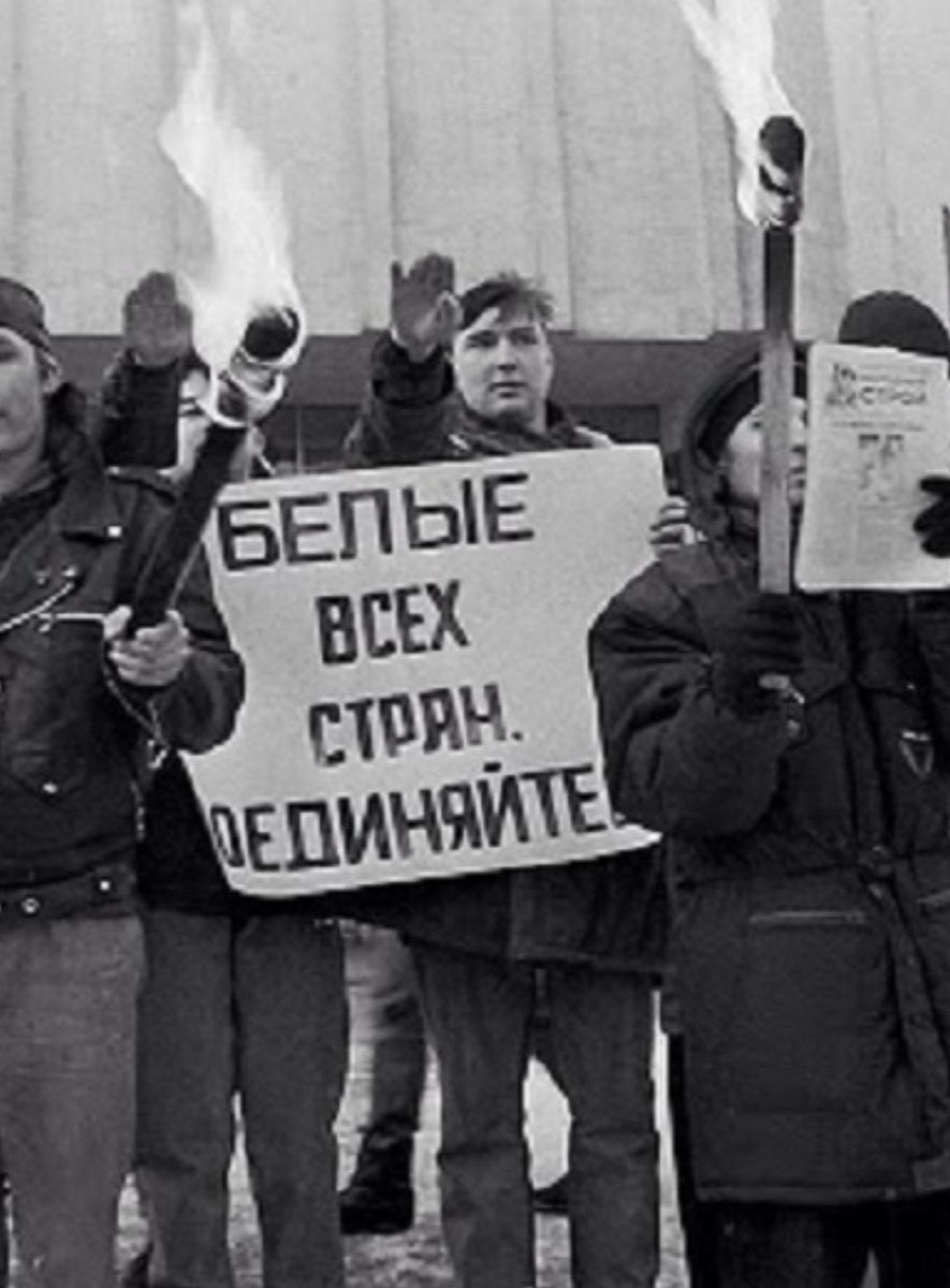 ArtfulTakedown's tweet photo. Hello @Rogozin , is this you?  What was that about de-Nazifying Ukraine?  Sit yourself down boy.

The sign: “white from all over the world - reunite” https://t.co/9TQnpk4Kqy