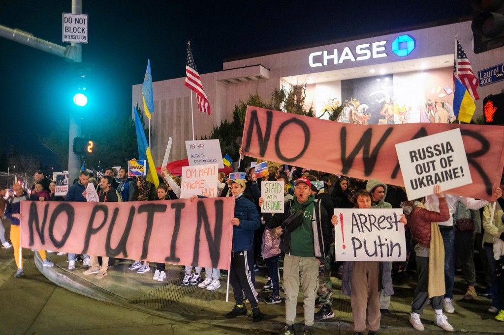 nypost's tweet photo. Russia-Ukraine conflict latest: Putin protesters flood LA streets https://t.co/fKs9HOIrC2 https://t.co/XW4N25Un3I