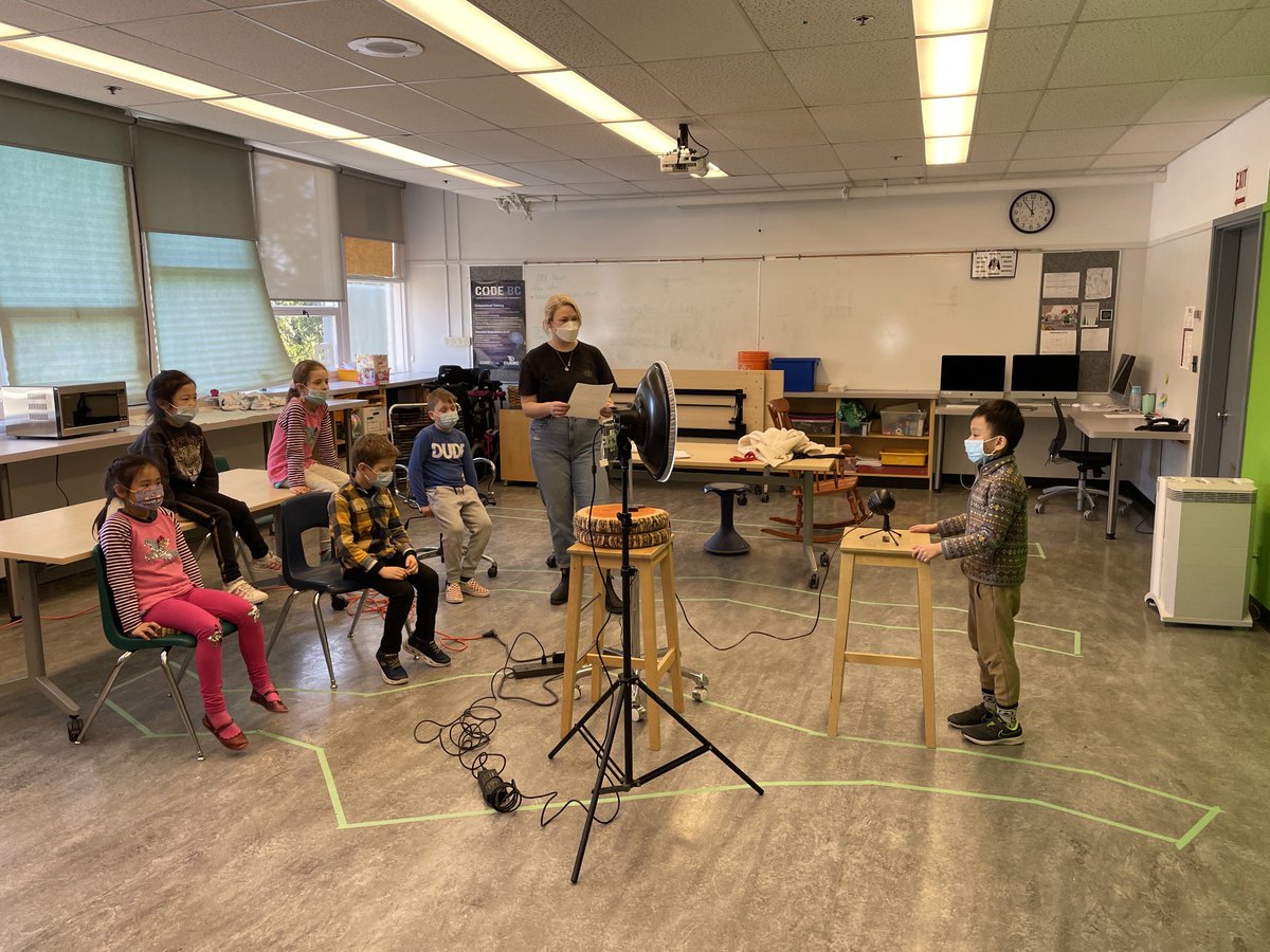CaulfeildSchool's tweet photo. Something ‘fishy’ is going on here!Future iDEC News members in the making?  Grade 2 students with ⁦@Ms_Lefeaux⁩ recording with the green screen today to share their knowledge of the salmon lifecycle. Looking forward to the final edits! #westvaned #bethebear https://t.co/caqMr16LiA