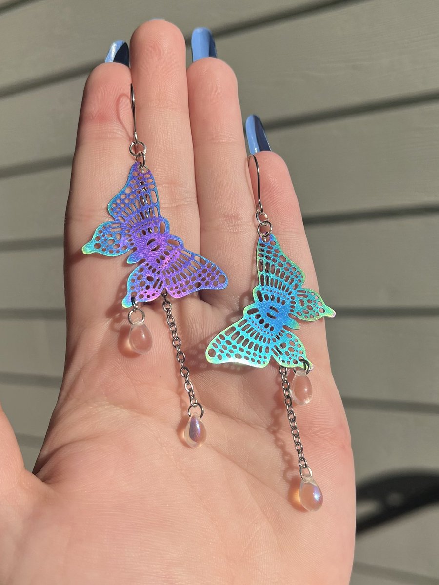 cateyekayla's tweet photo. reflective rainbow butterfly earrings🌈🥺 2 pairs left! https://t.co/PykJ7WmAU8