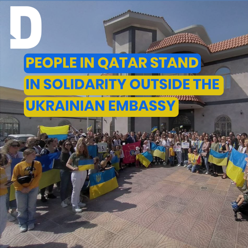 dohanews's tweet photo. 🇺🇦 Ukrainians in Qatar gathering outside the Embassy of #Ukraine in Doha on Friday morning, showing support for their country. 

🎤 They sang the country's national anthem and discussed ways to help their families who are in danger due to the Russian invasion.