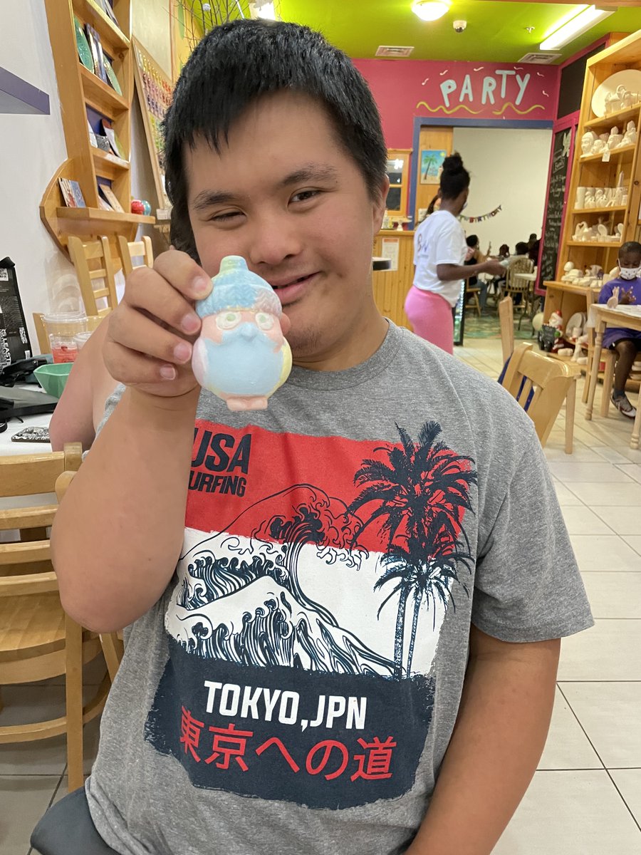 AdaptAbilities's tweet photo. Today's #FridayFeeling. Getting excited for HIA Camps to start up again. From our July 2021 camp session, Christian got to enjoy painting pottery and posing for the camera. Say cheese, Christian! #Yeg #AdaptAbilities #accessibility #Summer https://t.co/HKodz2ZMWw
