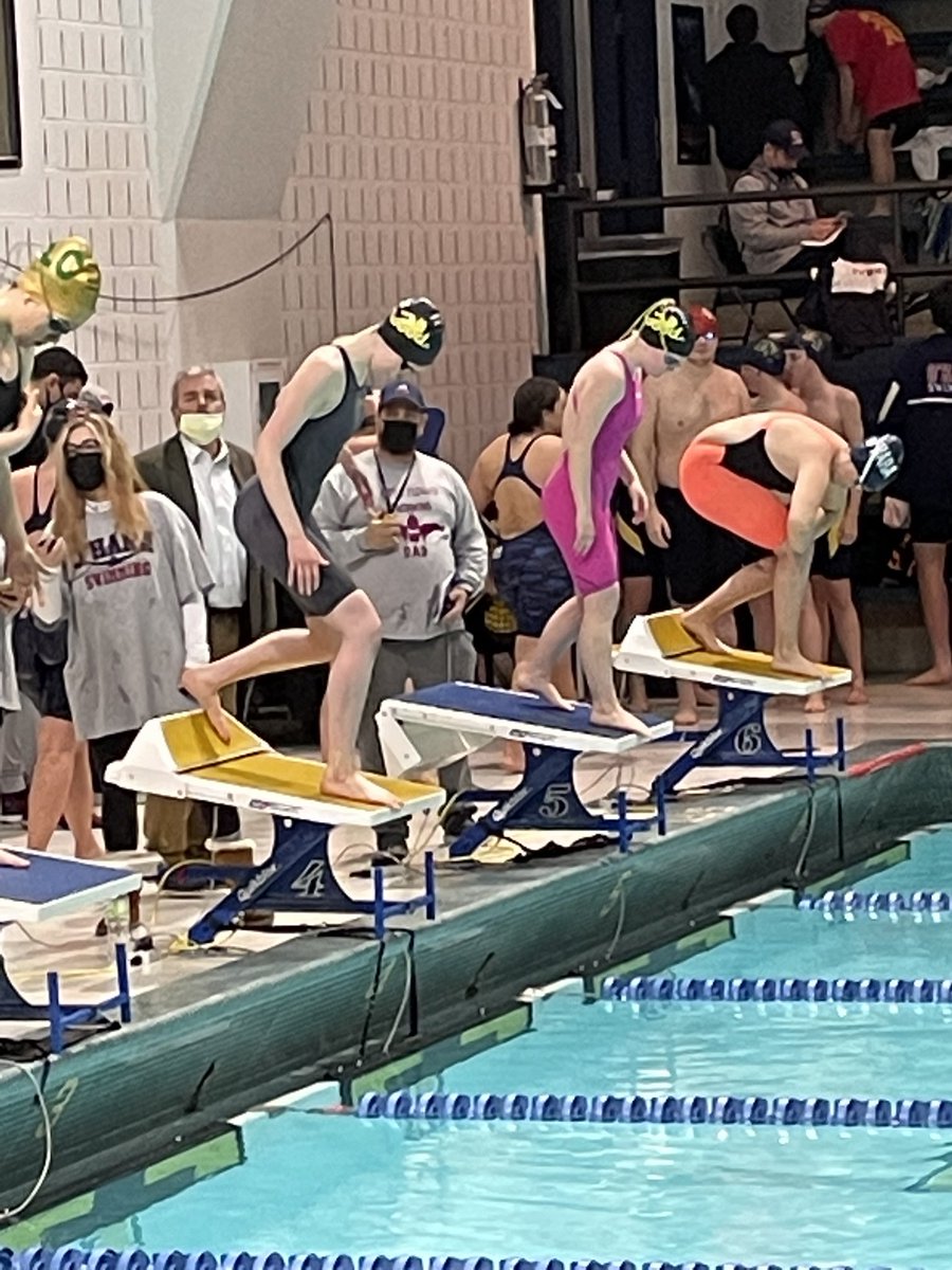 Wood girls swimmers competing in the 200 Freestyle.