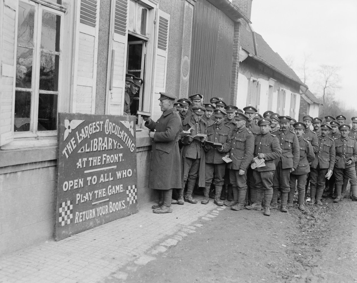 SimonJHistorian's tweet image. #OTD 26 February 1918 David McLellan took this magnificent photograph of the 34th Division lending library at Frevent, France. Are the sceptical readers 11th Suffolks @Taff_Gillingham? @I_W_M Q 8535 iwm.org.uk/collections/it…