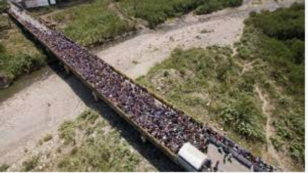 GNNUKSim2022's tweet photo. Reports from South America indicate that 3,000 people are gathered at the Simon Bolivar Bridge connecting Venezuela and Colombia, trying to cross into Colombia, as officials meet in Lima, Peru to work on migration crisis. #Simulation https://t.co/oHM0mnTQzq