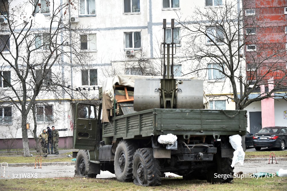 AFP's tweet photo. #UPDATE Ukrainian forces fought off Russian troops in the capital #Kyiv on Friday on the second day of a conflict that has claimed dozens of lives, as Russian President Vladimir Putin called on the Ukrainian army to remove the country's leadership https://t.co/NZKavtzt4A https://t.co/q0xiV0uDkN