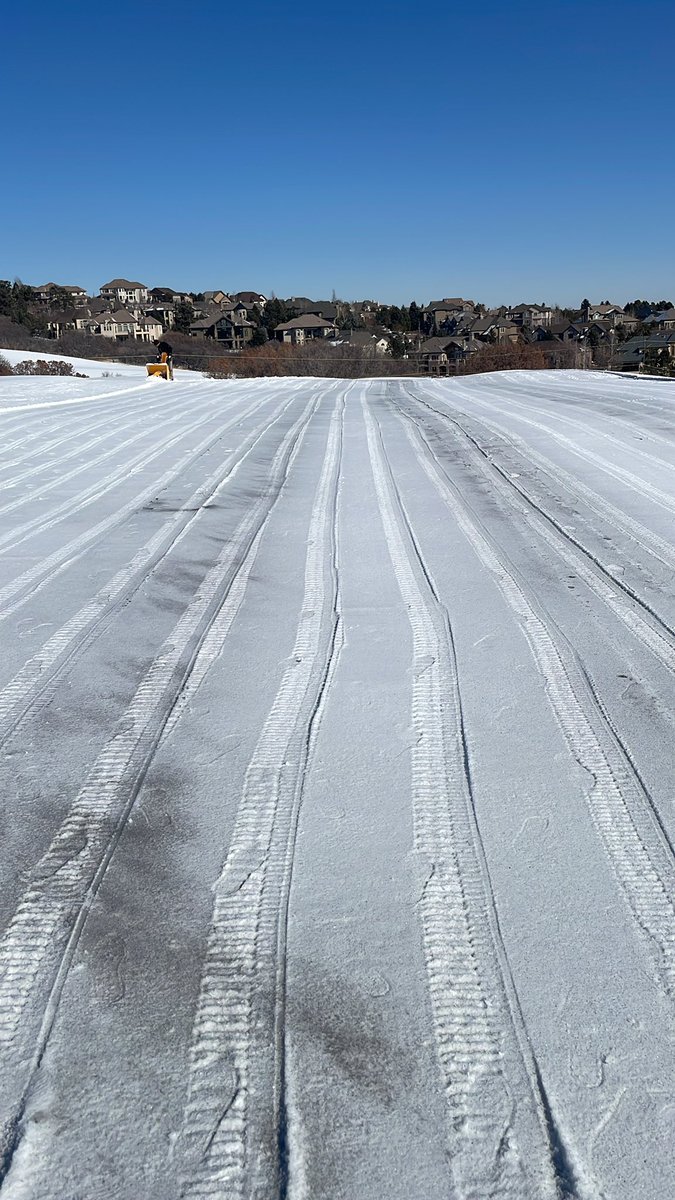 Clearing greens and getting black sand down for some warm temps