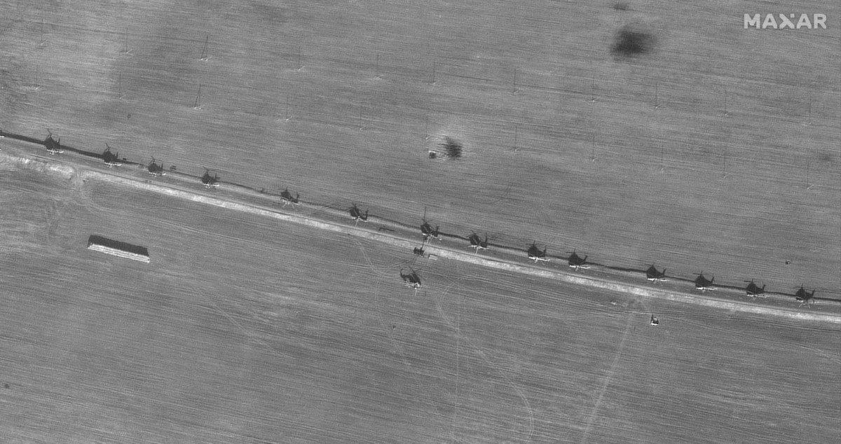 BenDoBrown's tweet photo. Satellite imagery from today shared by @Maxar shows  large helicopter deployment near the Belarusian town of Chojniki (Хойнікі), close to the border of Ukraine, and contains more than 90 helicopters parked on a road. Location: https://t.co/QYPdDYoUpv https://t.co/s2fZoFeCyv