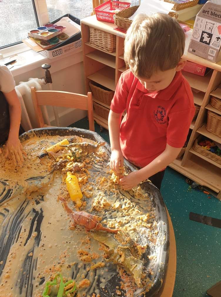 Philiphaughcs's tweet photo. P1 have been having lots of messy fine motor fun on Fridays. Here they are making dinosaur food and talking about textures, shapes, colours and patterns. Looks like amazing fun! 🦕 @SBCEducation1 https://t.co/Kzh2OUEYVP