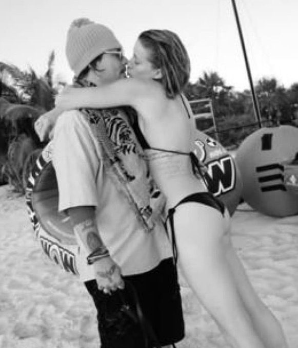 No_Reason_Jenz's tweet photo. So Amber Heard claims she was sexually assaulted during this time, yet here are pics from this trip of her practically throwing herself and pawing at Johnny....definitely not the actions of someone who is a sexual assault victim...
She's a liar and should be held accountable! https://t.co/8woEZuFzYV