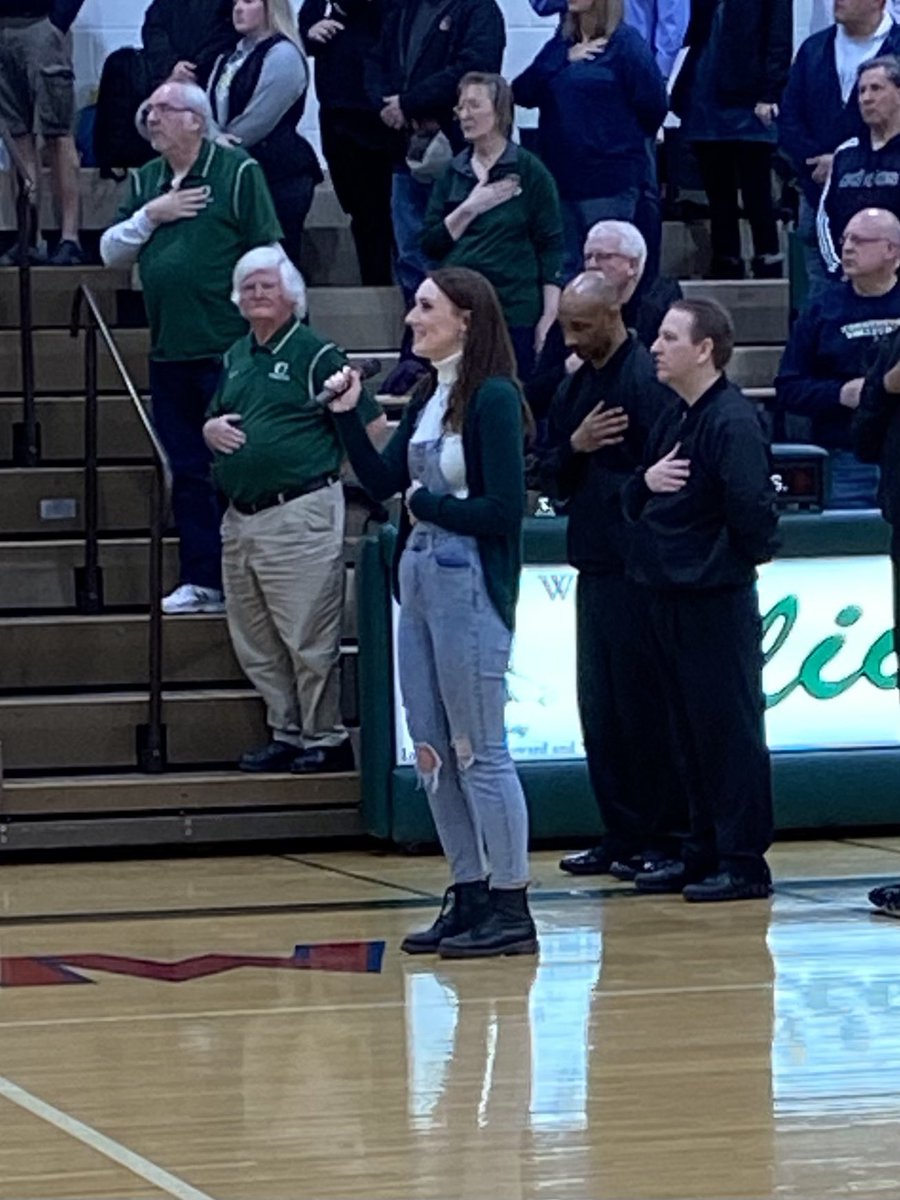OlivetHS_Eagles's tweet photo. Emma Garrett has blessed us with her voice for the last four years and it was fitting that she sang the National Anthem on senior night. We will miss hearing you in the future. #EagleNationPRIDE https://t.co/fqZpK1r34D