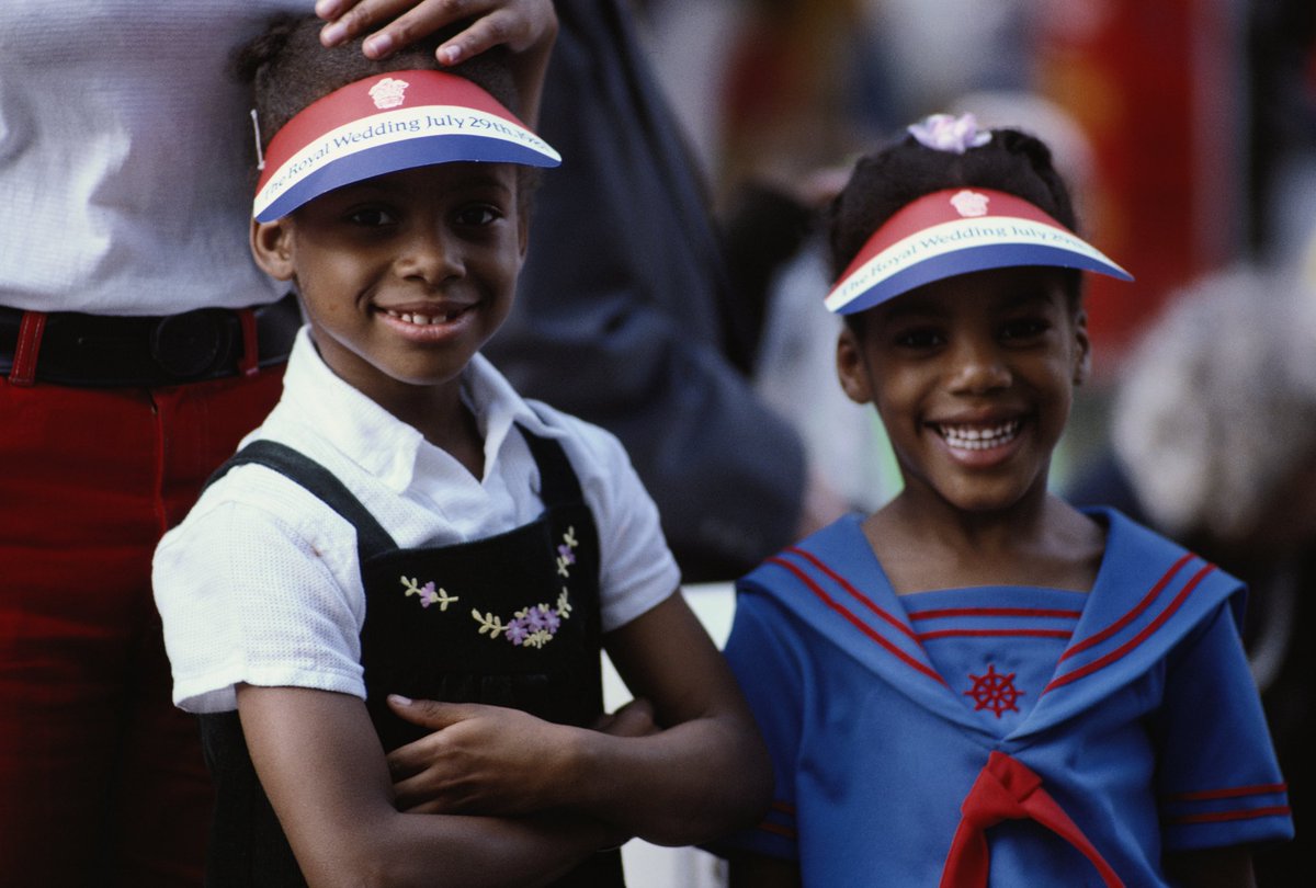 Two girls at the wedding of Prince Charles and Lady Diana Spencer, London, 29th July 1981. (Photo by Keystone/Getty Images) #blackhistoryculturecollection