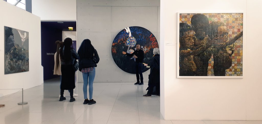 Legacies_Biafra's tweet photo. Happening now - the final tour of @GalleryOldham of the Legacies of Biafra exhibition led by @HassartAliyu https://t.co/eL4I0B6EmD